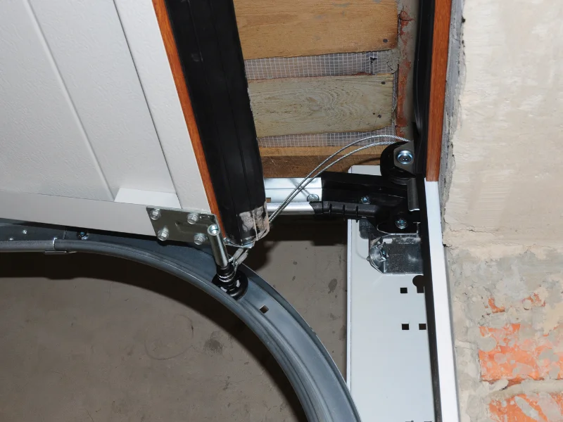 Garage door spring assembly exposed during repair