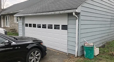 White sectional garage door on a residential home