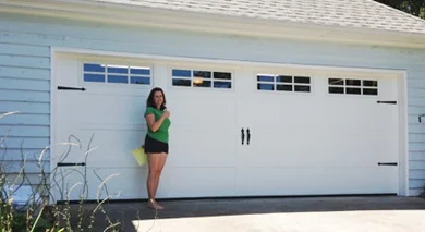 White garage door with blue window panels