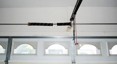 Garage door track and overhead opening mechanism